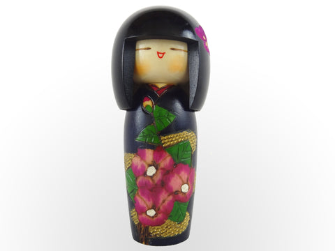 Hanashizuku Cute little girl in a navy blue kimono with carved pink flower kokeshi K-2