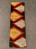 Vintage Japanese black silk obi with gold and silver design framed in red